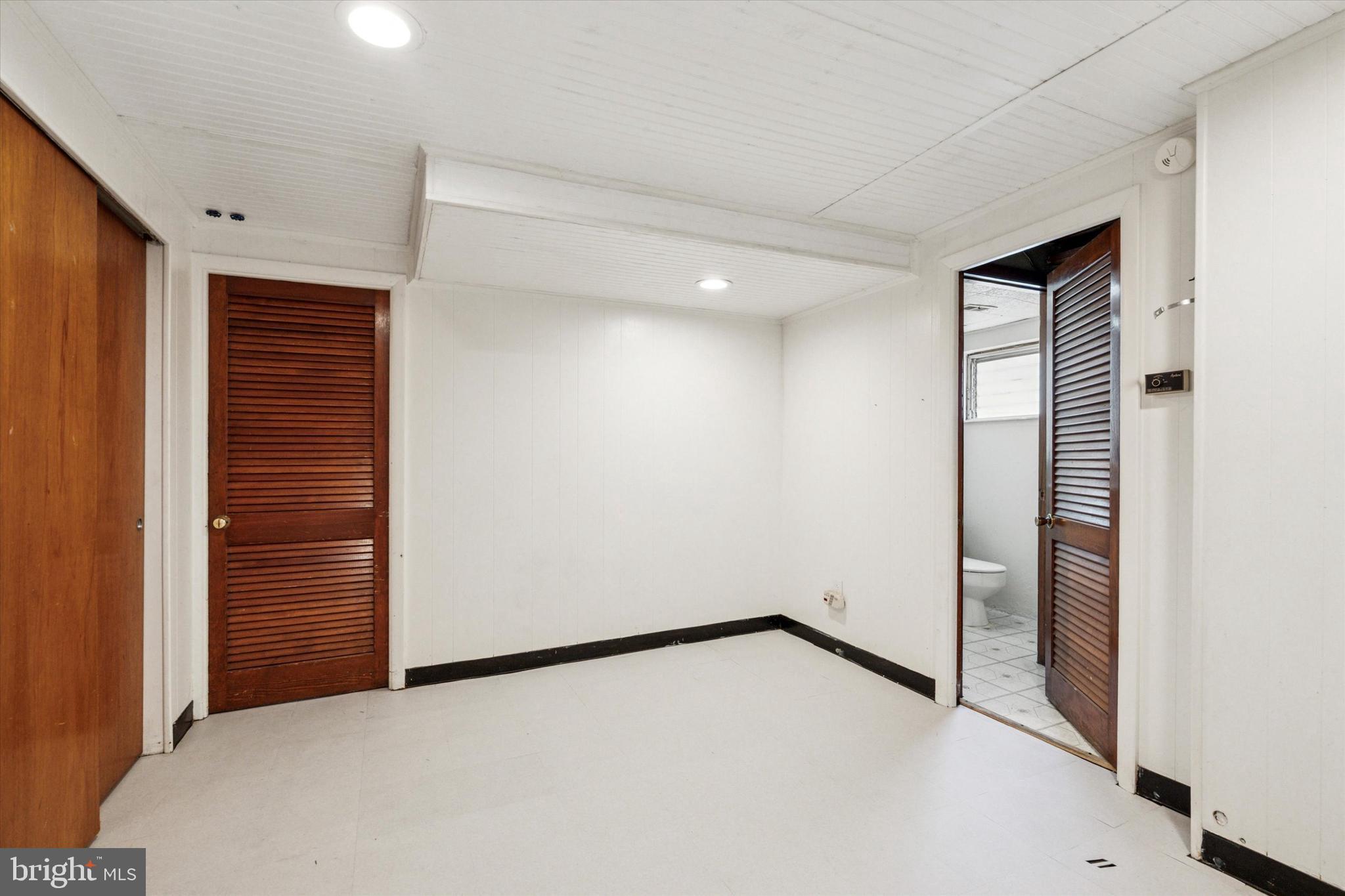 2678 Tremont Street Philadelphia, PA 19152 - Photo 23 of 24 an empty room with windows