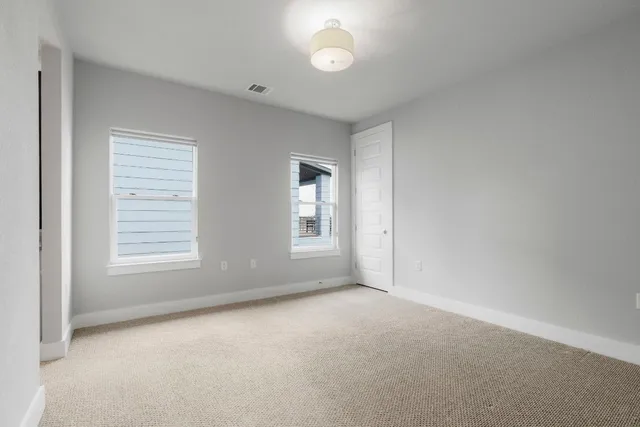 a bathroom with a sink double vanity and a mirror
