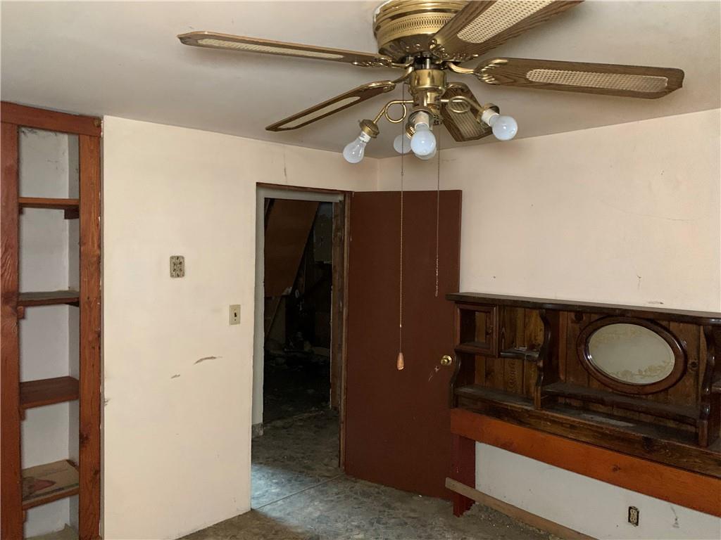 302 Arcadia Road Arcadia, PA 15712 - Photo 12 of 25 a bathroom with a sink and a mirror