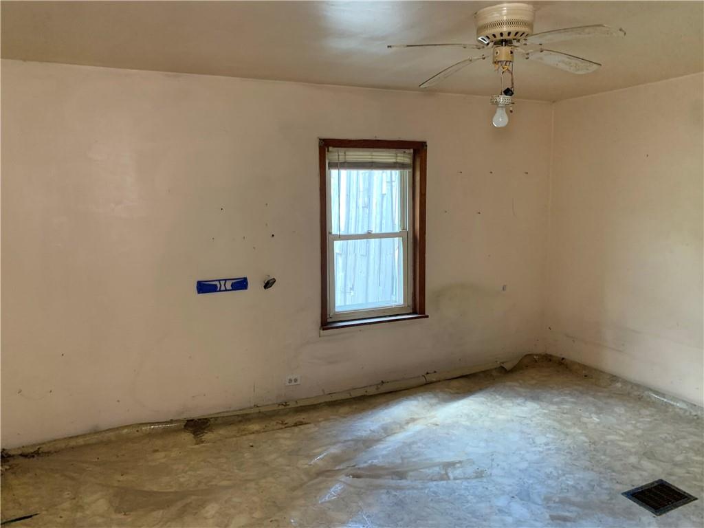 302 Arcadia Road Arcadia, PA 15712 - Photo 15 of 25 an empty room with a window