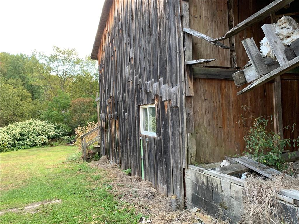302 Arcadia Road Arcadia, PA 15712 - Photo 21 of 25 a view of a house with backyard and garden