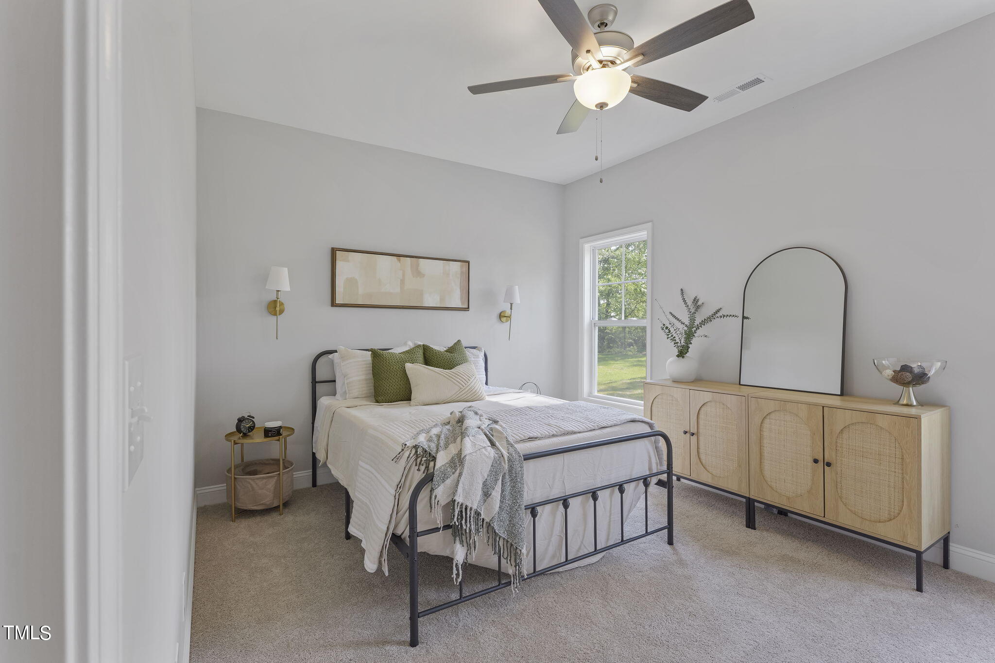 93 Regis Lane Coats, NC 27521 - Photo 17 of 31 a bedroom with a bed and a dresser