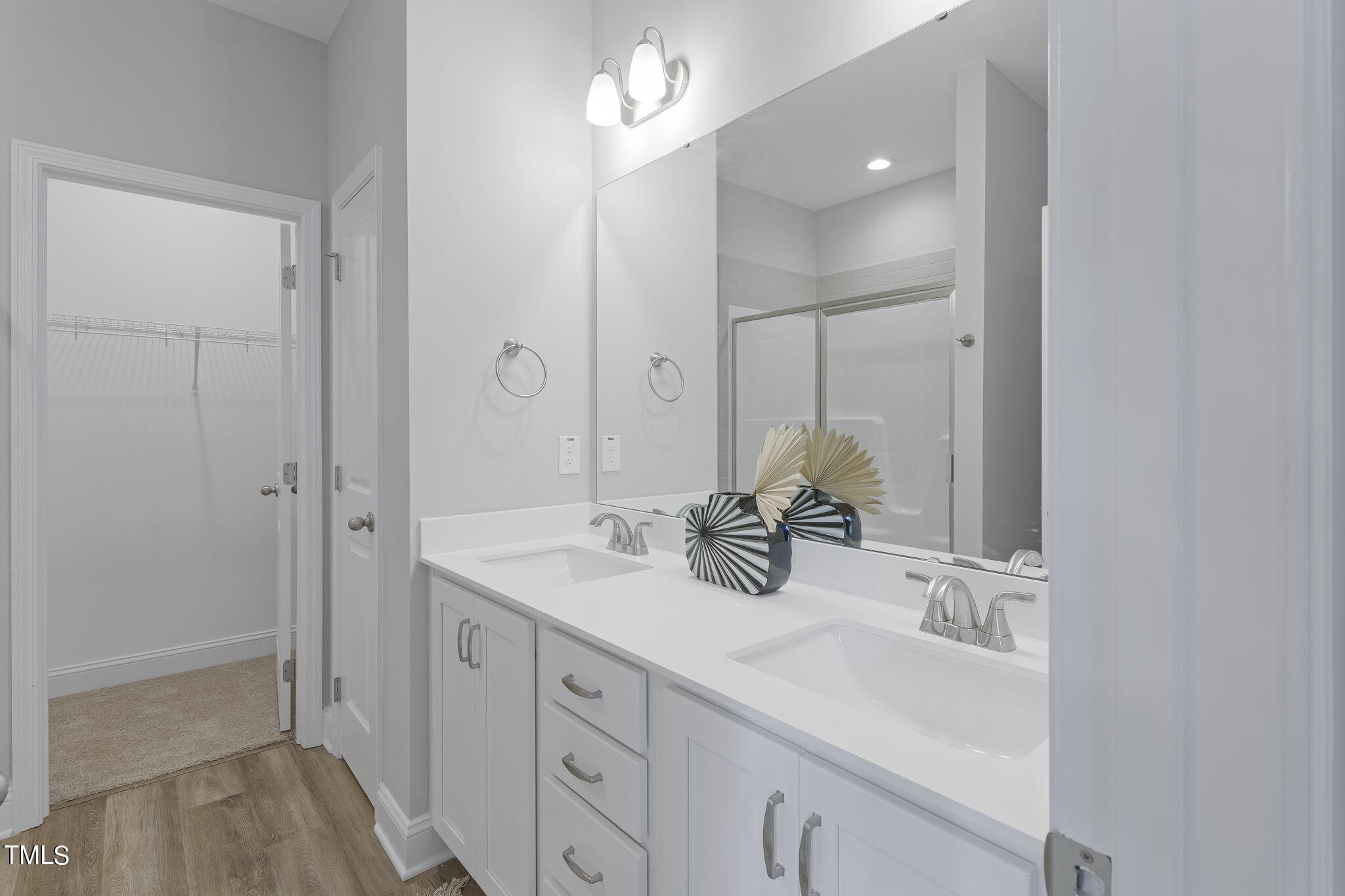 93 Regis Lane Coats, NC 27521 - Photo 18 of 31 a bathroom with a sink double vanity and a mirror