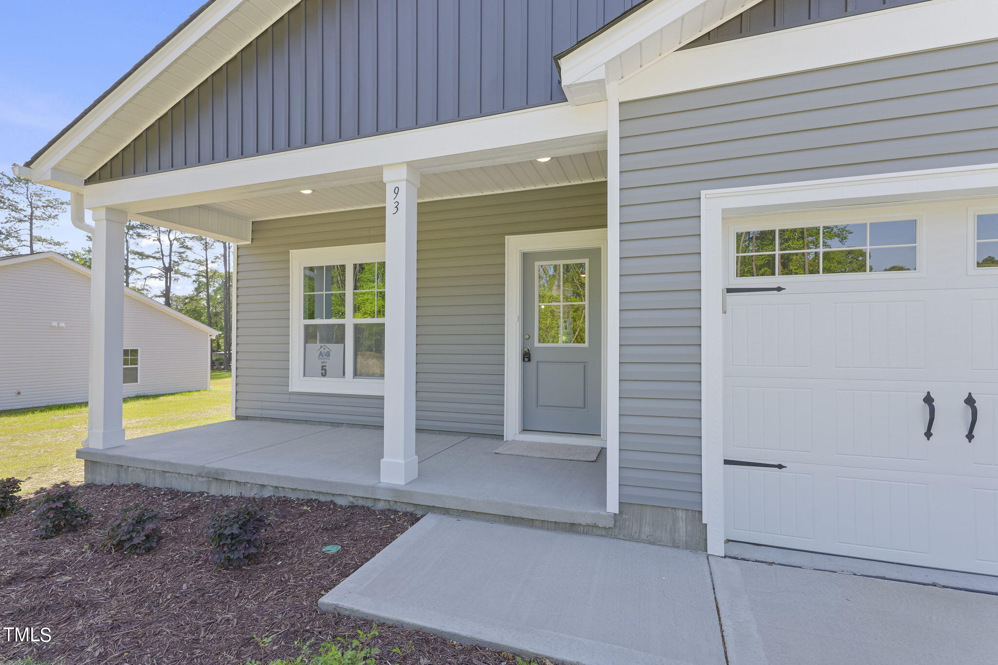 93 Regis Lane Coats, NC 27521 - Photo 2 of 31 a view of a house with a swimming pool
