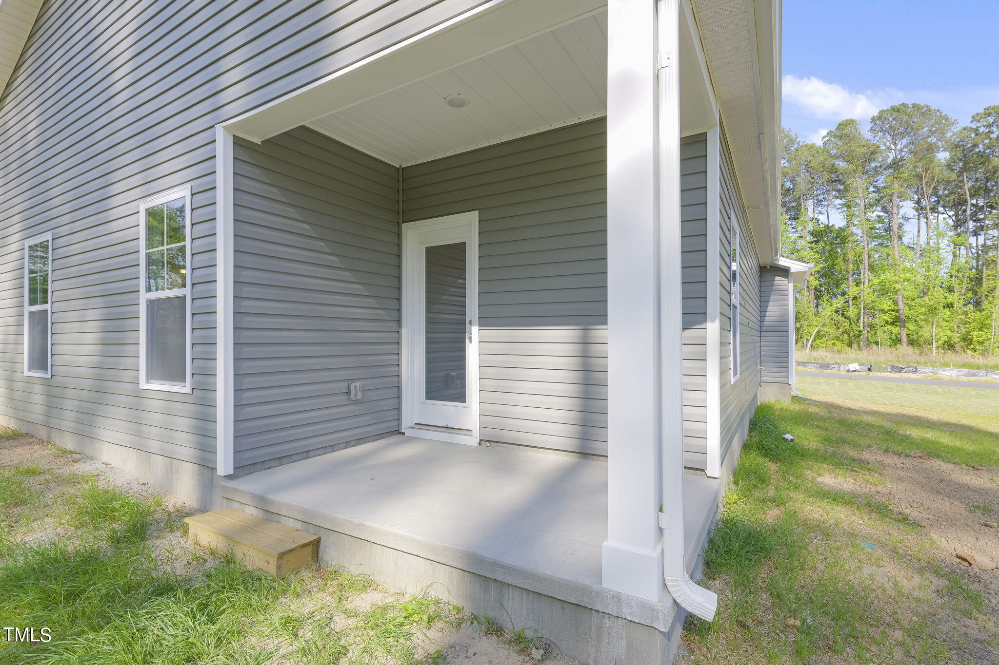 93 Regis Lane Coats, NC 27521 - Photo 25 of 31 a view of house with backyard