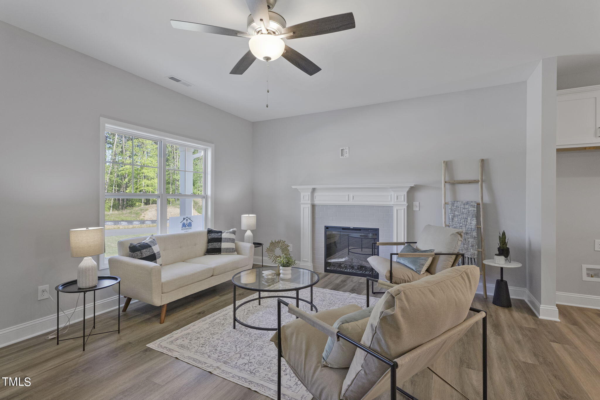 93 Regis Lane Coats, NC 27521 - Photo 5 of 31 a living room with furniture and a fireplace