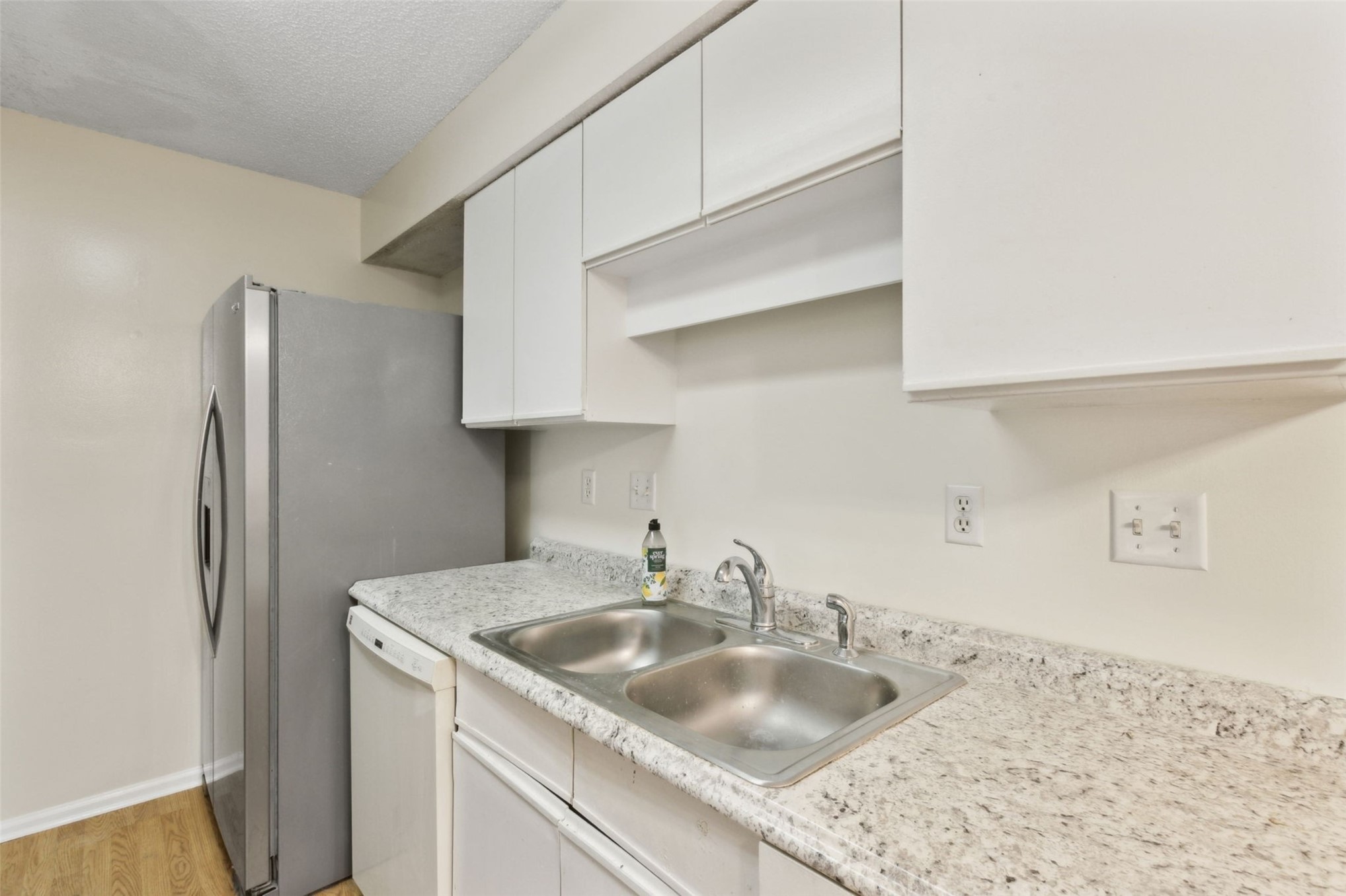 2583 Forest Ridge Drive, Unit N3 Fernandina Beach, FL 32034 - Photo 15 of 34 a kitchen with stainless steel appliances granite countertop a sink stove and refrigerator