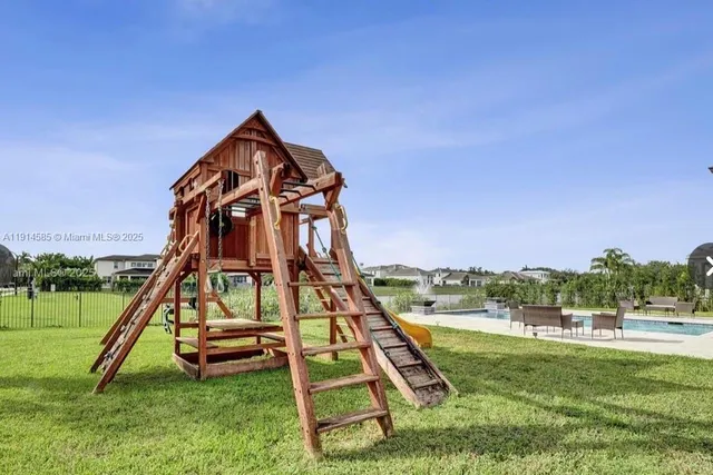 a view of a park with a slide