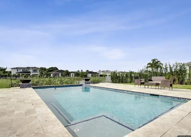 a view of a swimming pool and lake view
