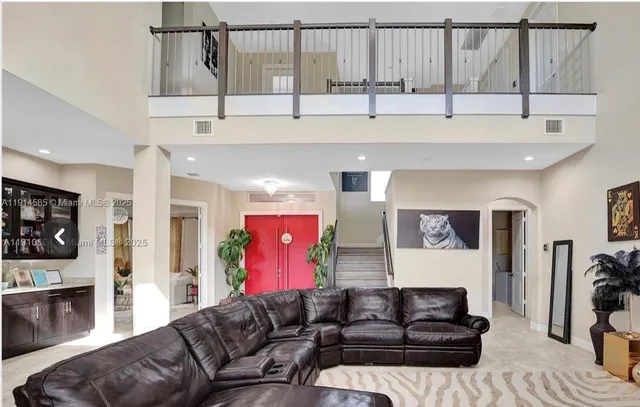 a living room with furniture and a couch