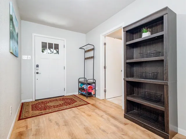 a bedroom with a bed and a cabinets