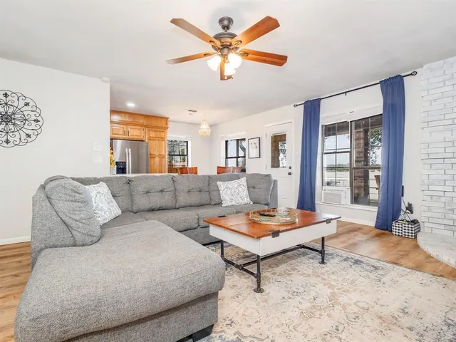 a living room with furniture and a rug