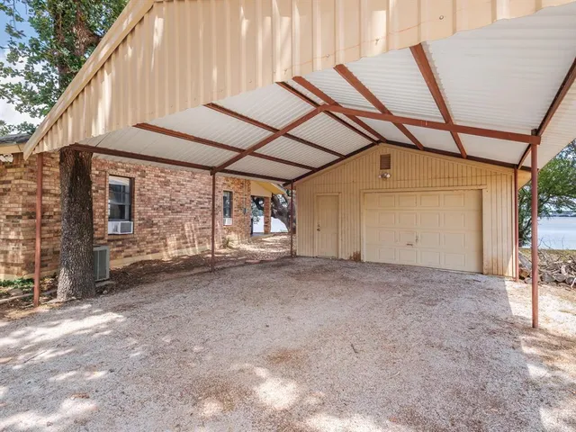 a view of a backyard of a house