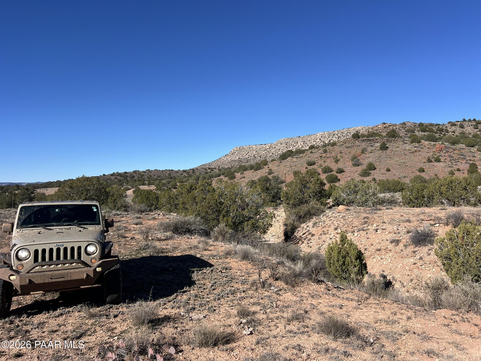 298 Quartz Hill Road Ash Fork, AZ 86320 - Photo 1 of 15 a view of a sky from a yard