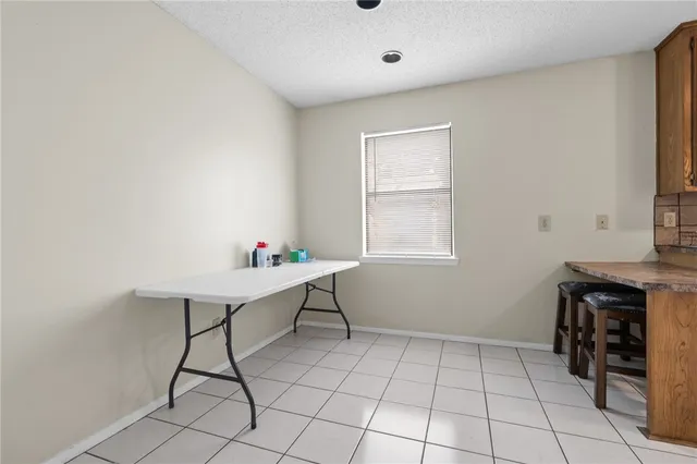 a workspace with furniture and window