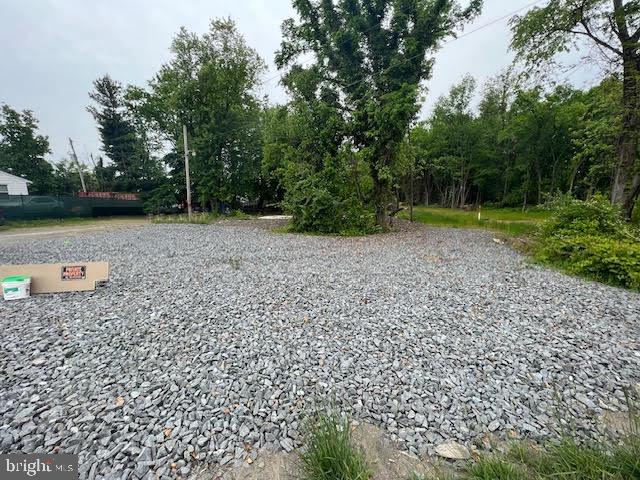 a view of a tiny house with a yard
