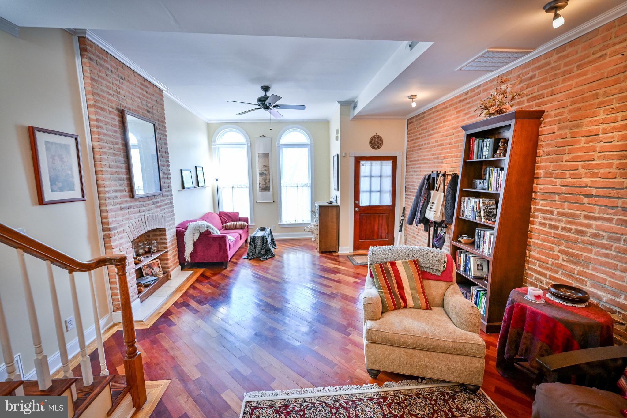 240 Wilson Street Baltimore, MD 21217 - Photo 13 of 63 a living room with furniture and a flat screen tv