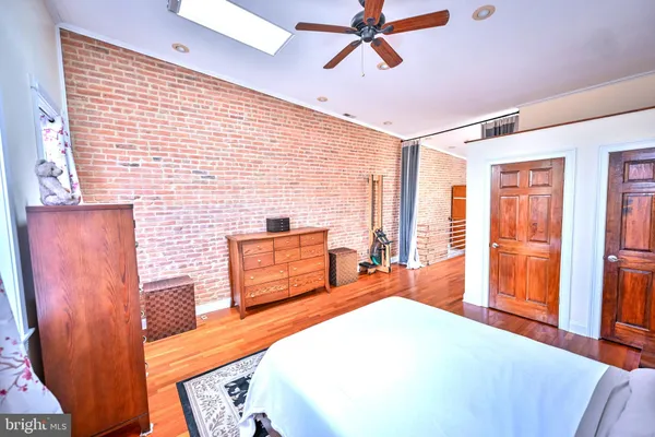 a balcony with table and chairs