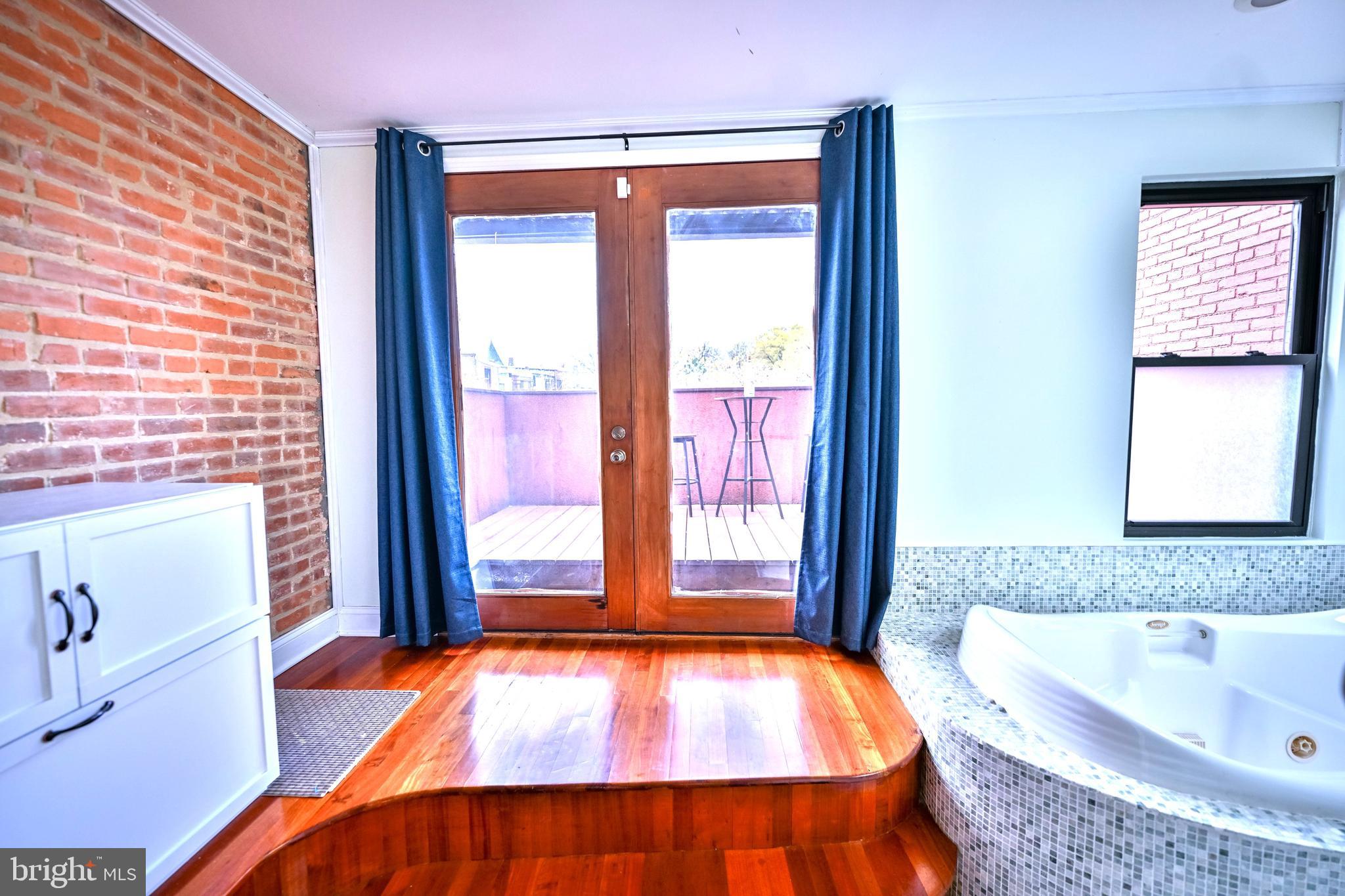 240 Wilson Street Baltimore, MD 21217 - Photo 49 of 63 Double doors to patio