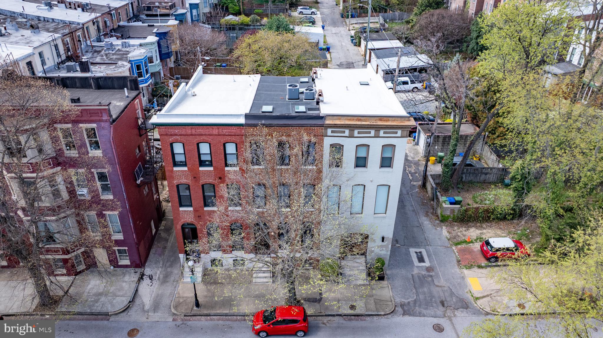 240 Wilson Street Baltimore, MD 21217 - Photo 5 of 63 Brick Front Rowhome on tree-lined street