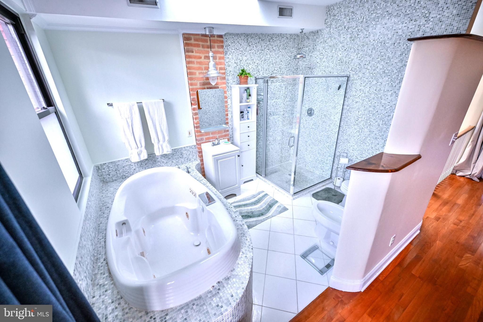 240 Wilson Street Baltimore, MD 21217 - Photo 52 of 63 a view of a livingroom with furniture and wooden floor