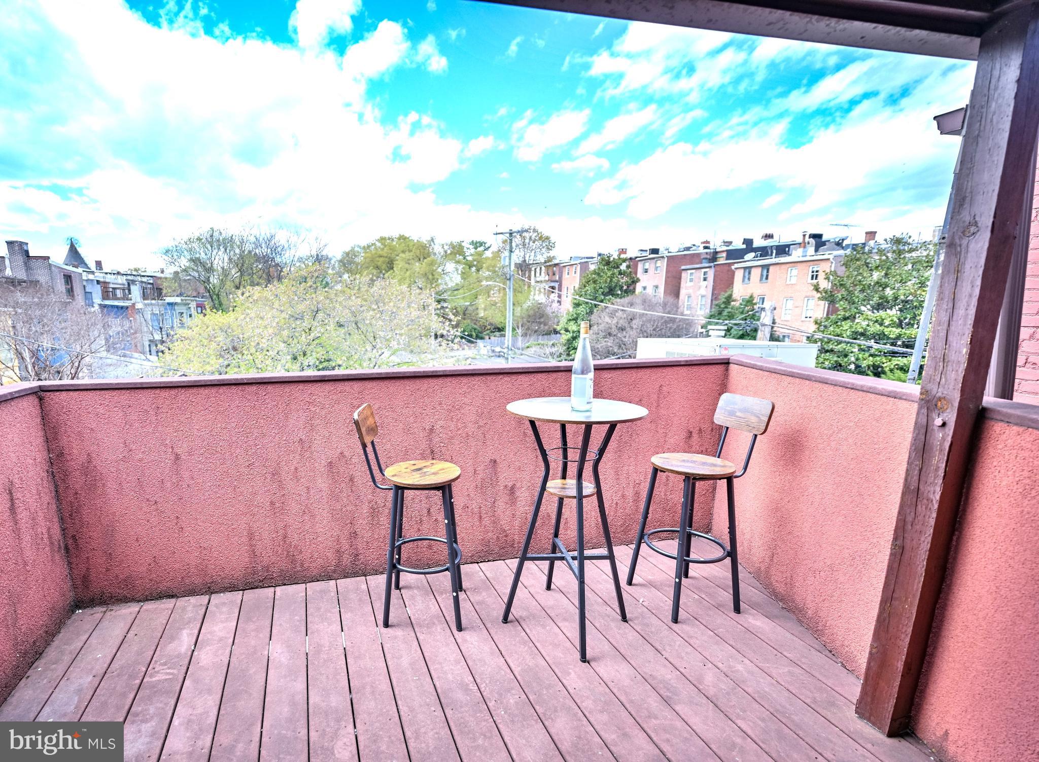 240 Wilson Street Baltimore, MD 21217 - Photo 54 of 63 a view of a chairs on the roof deck