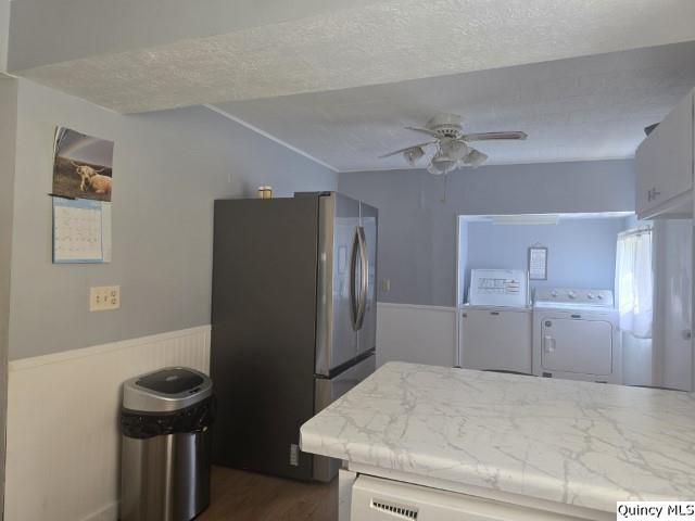 1541 Elm Street Hamilton, IL 62341 - Photo 12 of 31 a room with a refrigerator and ceiling fan