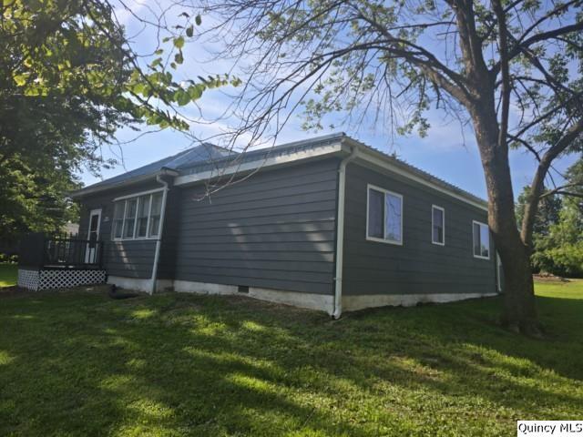1541 Elm Street Hamilton, IL 62341 - Photo 28 of 31 a backyard of a house with lots of green space