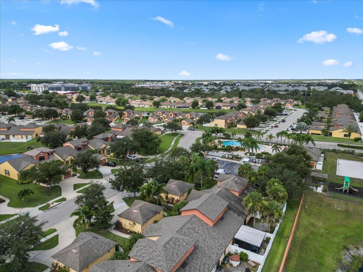 750 Luminary Circle, Unit 103 Melbourne, FL 32901 - Photo 24 of 39 an aerial view of multiple house
