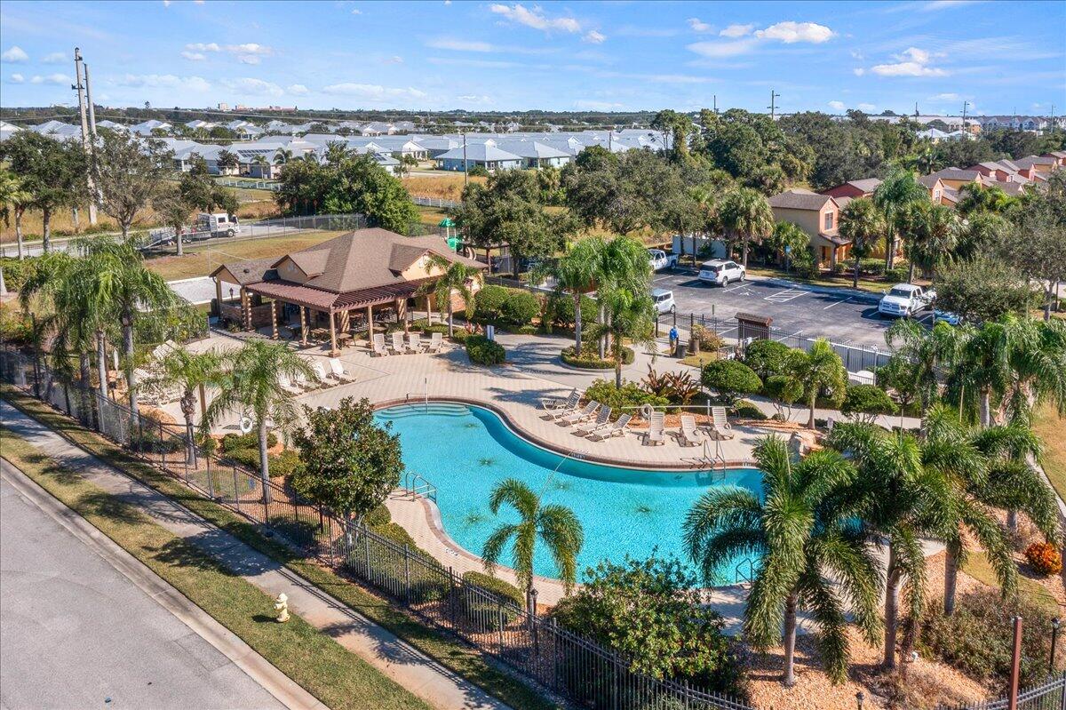 750 Luminary Circle, Unit 103 Melbourne, FL 32901 - Photo 30 of 39 an aerial view of a house with a garden