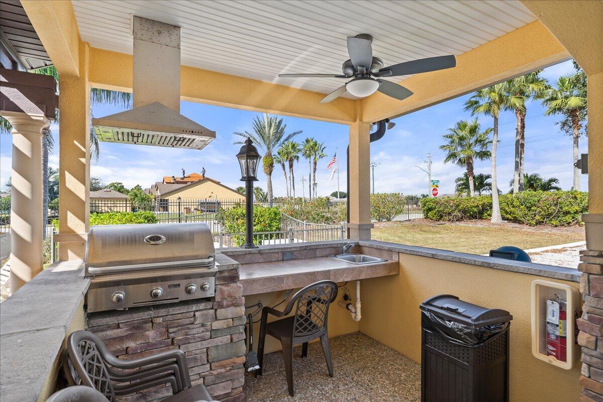 750 Luminary Circle, Unit 103 Melbourne, FL 32901 - Photo 34 of 39 a view of a patio with a table and chairs