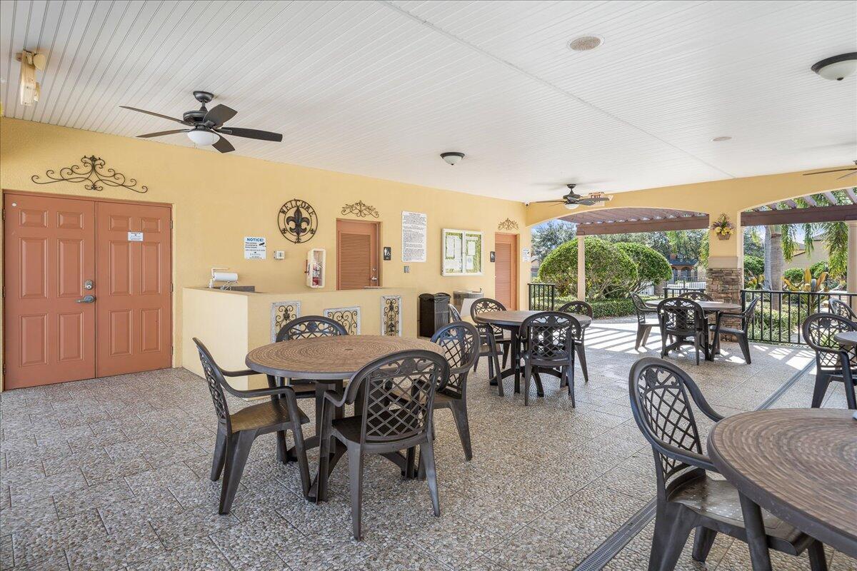 750 Luminary Circle, Unit 103 Melbourne, FL 32901 - Photo 36 of 39 a view of a dining room with furniture window and outside view