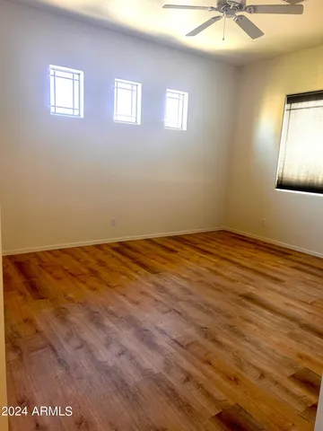 a view of a big room with wooden floor
