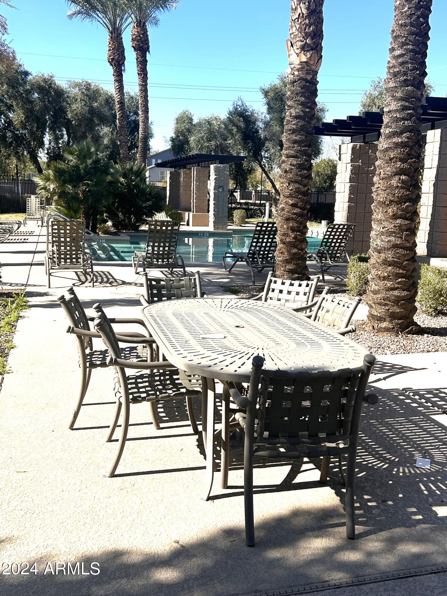 1225 North 36th Street, Unit 2115 Phoenix, AZ 85008 - Photo 27 of 36 a view of an outside dining space with furniture