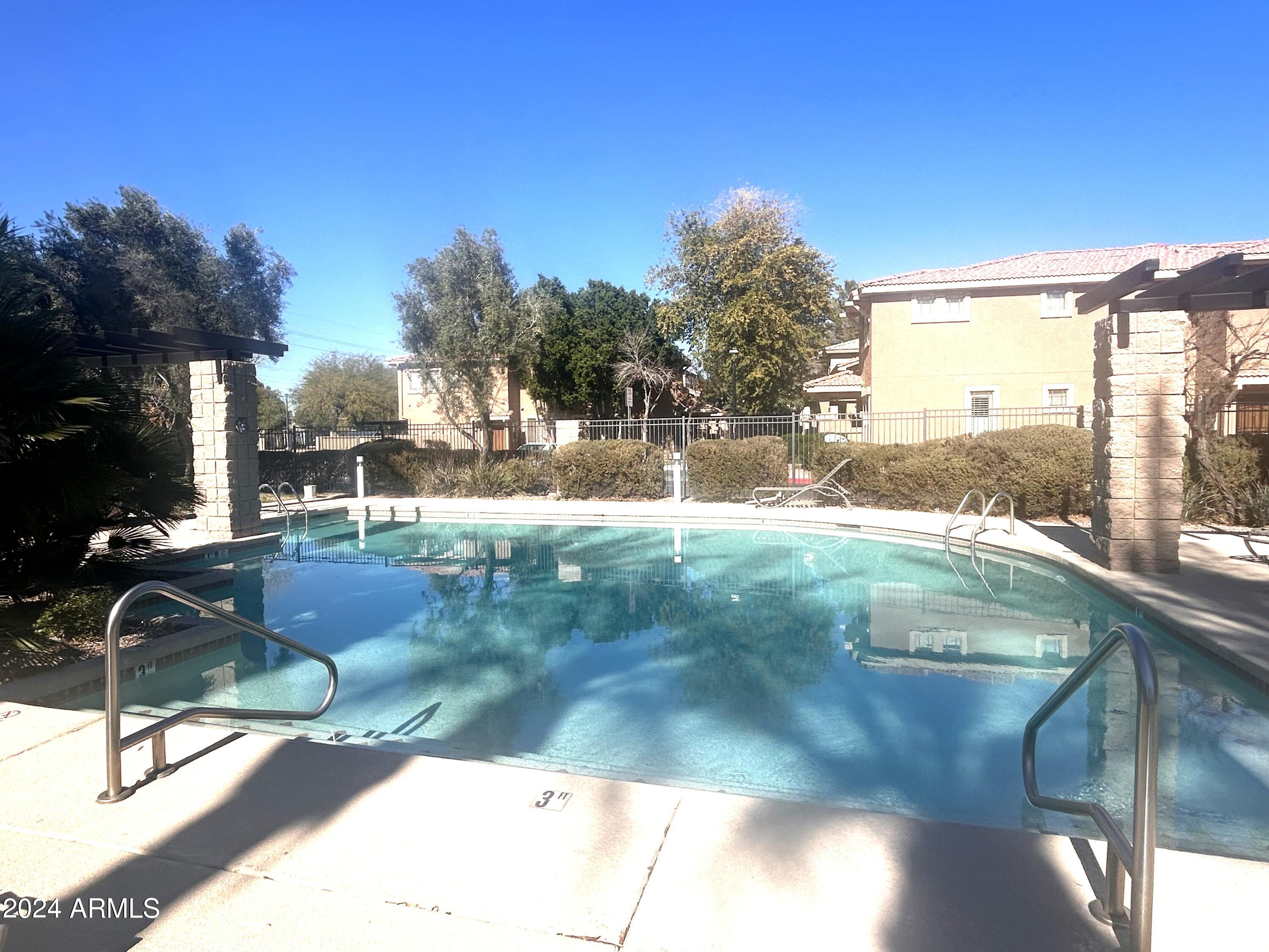 1225 North 36th Street, Unit 2115 Phoenix, AZ 85008 - Photo 28 of 36 a view of a backyard of a house