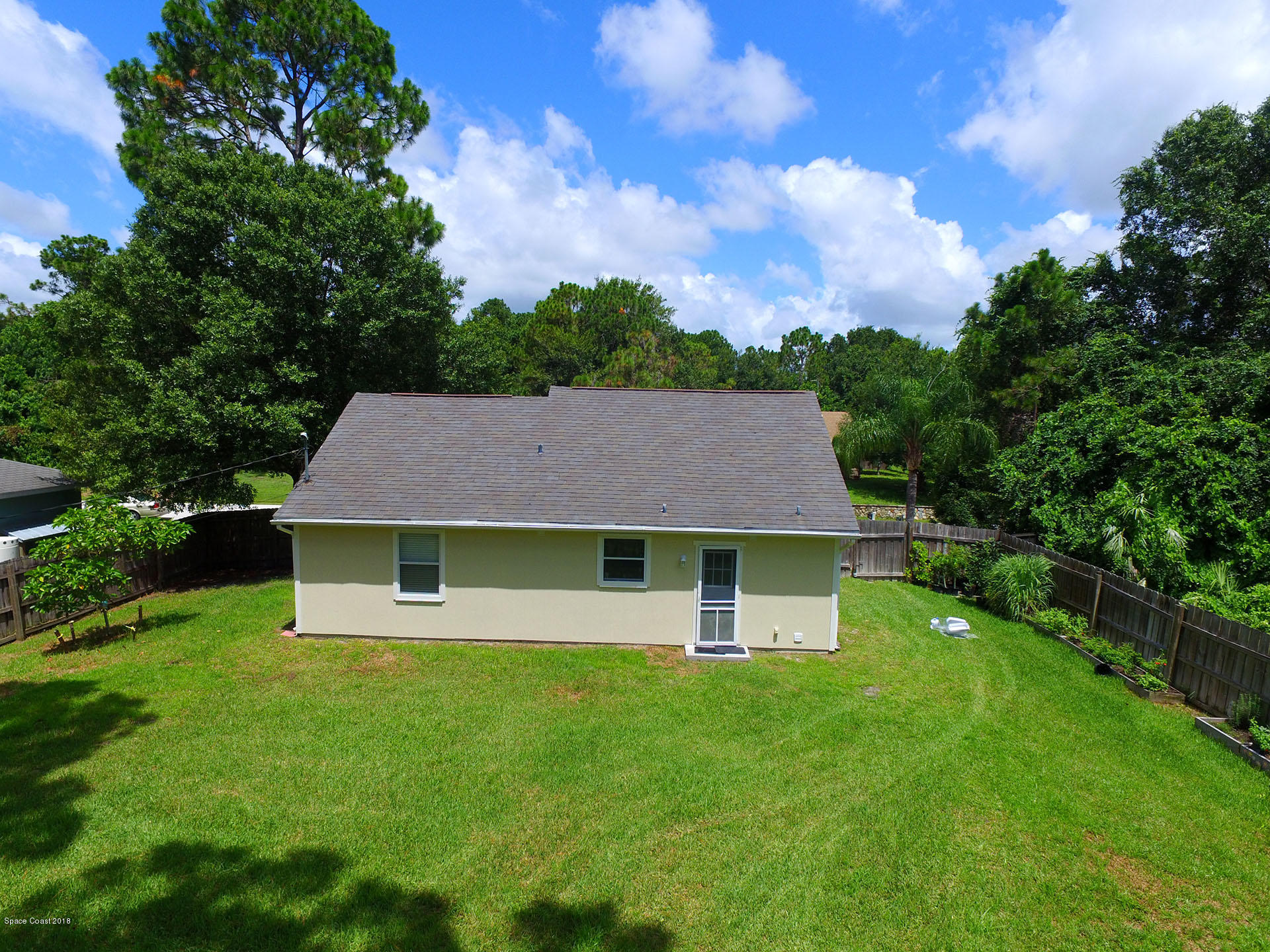 1182 Terry Road Southeast Palm Bay, FL 32909 - Photo 2 of 22 Aerial of the rear of the house