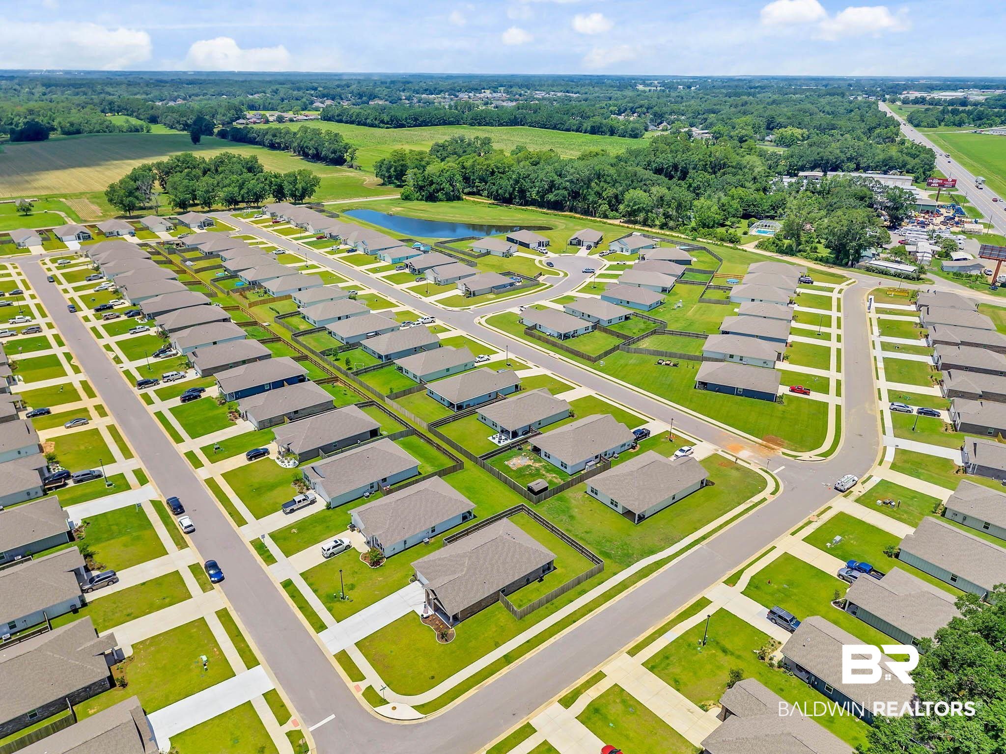 17217 REFLECTION Street Loxley, AL 36551 - Photo 73 of 83 Drone / aerial view of a nearby body of water