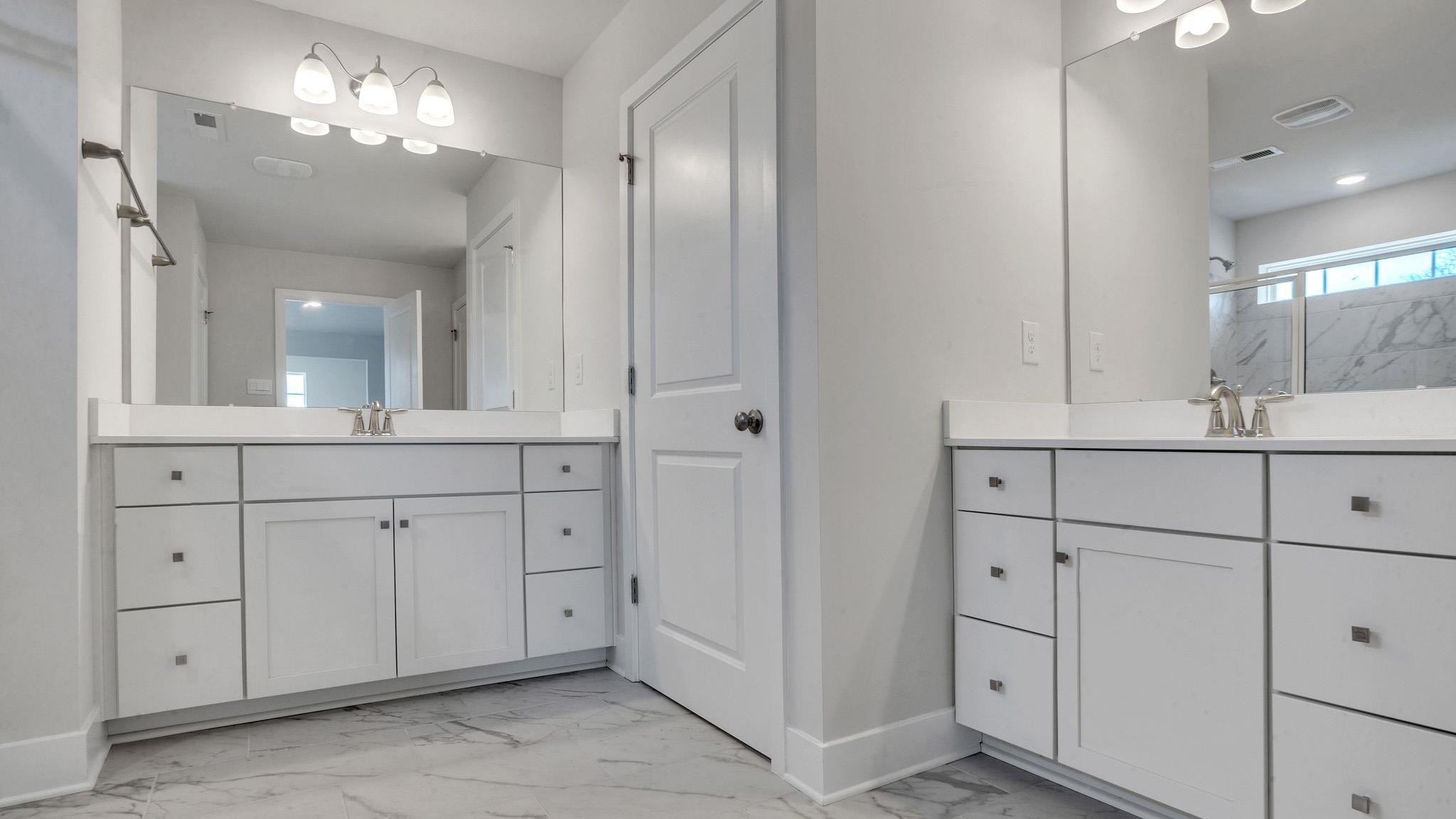 13 Henry Marmora, NJ 08223 - Photo 13 of 21 a bathroom with a double vanity sink and mirror