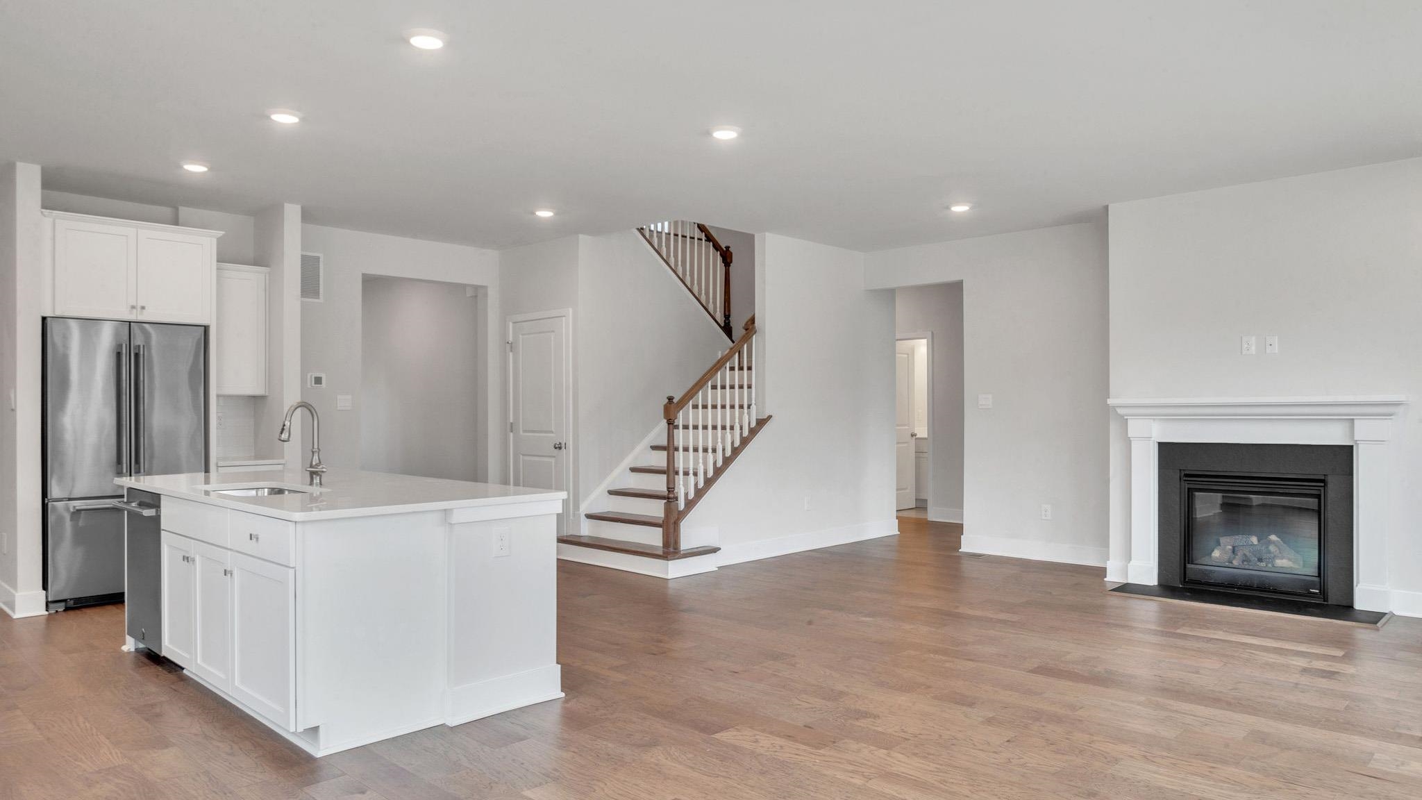 13 Henry Marmora, NJ 08223 - Photo 7 of 21 a view of a livingroom with kitchen and fireplace