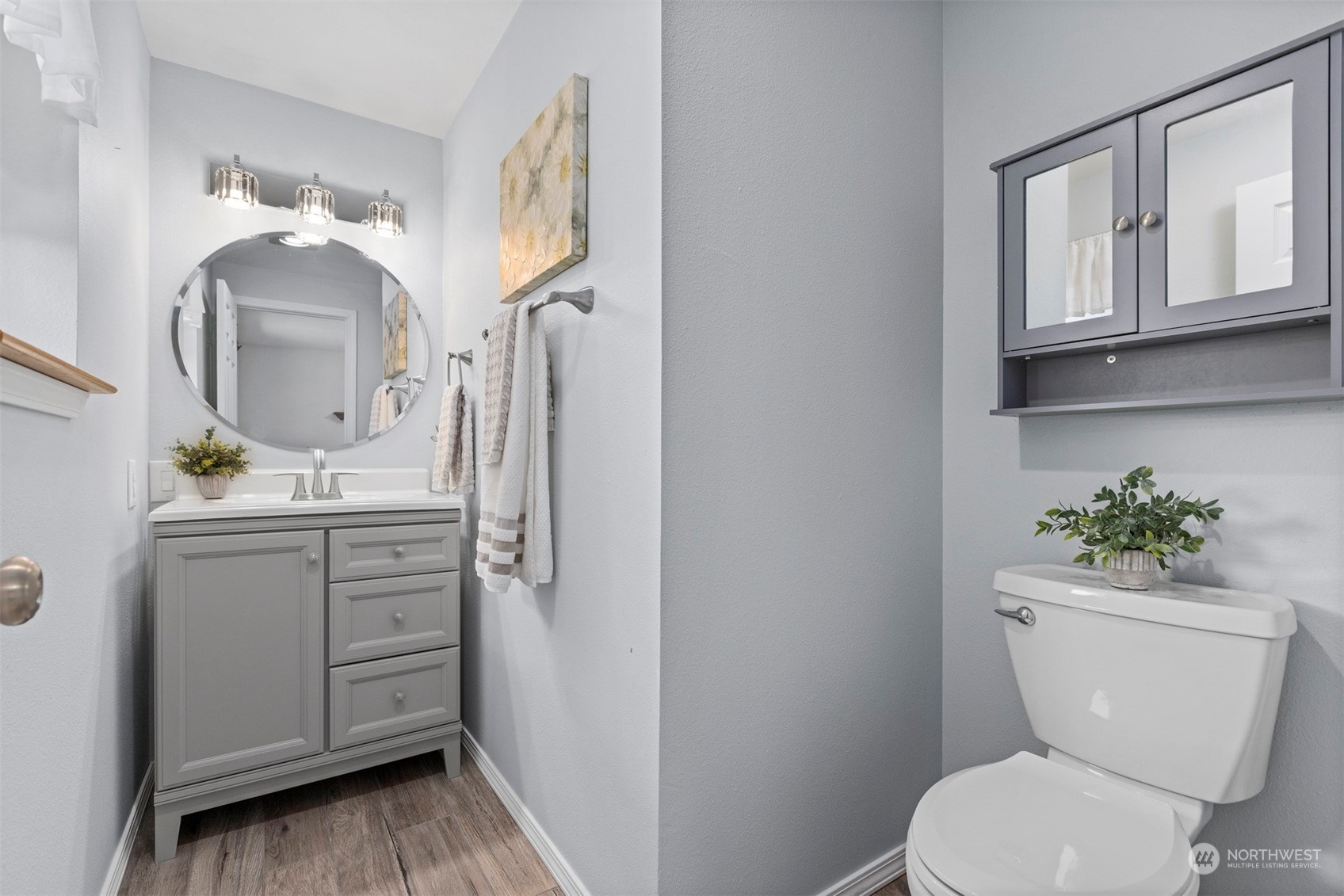 804 Chestnut Street Everson, WA 98247 - Photo 13 of 22 a bathroom with a toilet sink and mirror