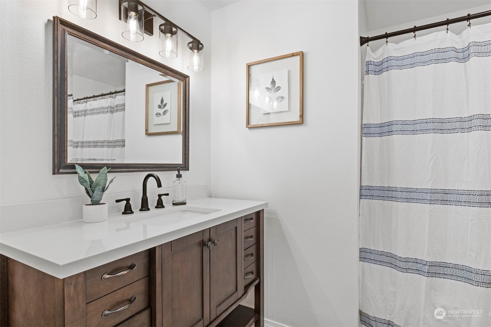 804 Chestnut Street Everson, WA 98247 - Photo 16 of 22 a bathroom with a sink vanity and a mirror