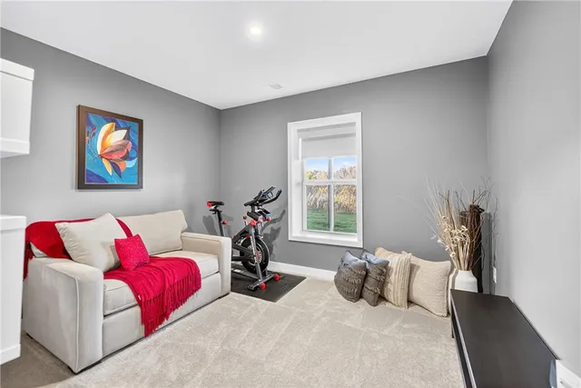 a bedroom with furniture and a bed