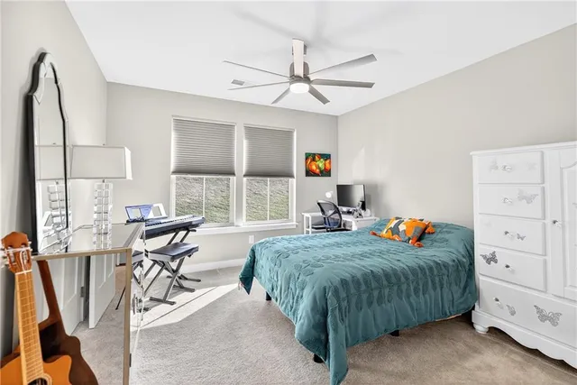 a bedroom with a bed and furniture