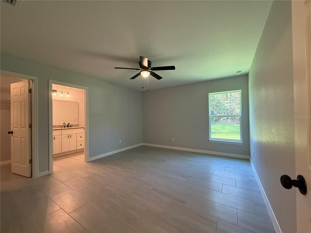 2531 Smallwood Road Dunnellon, FL 34431 - Photo 10 of 15 a view of an empty room with a window