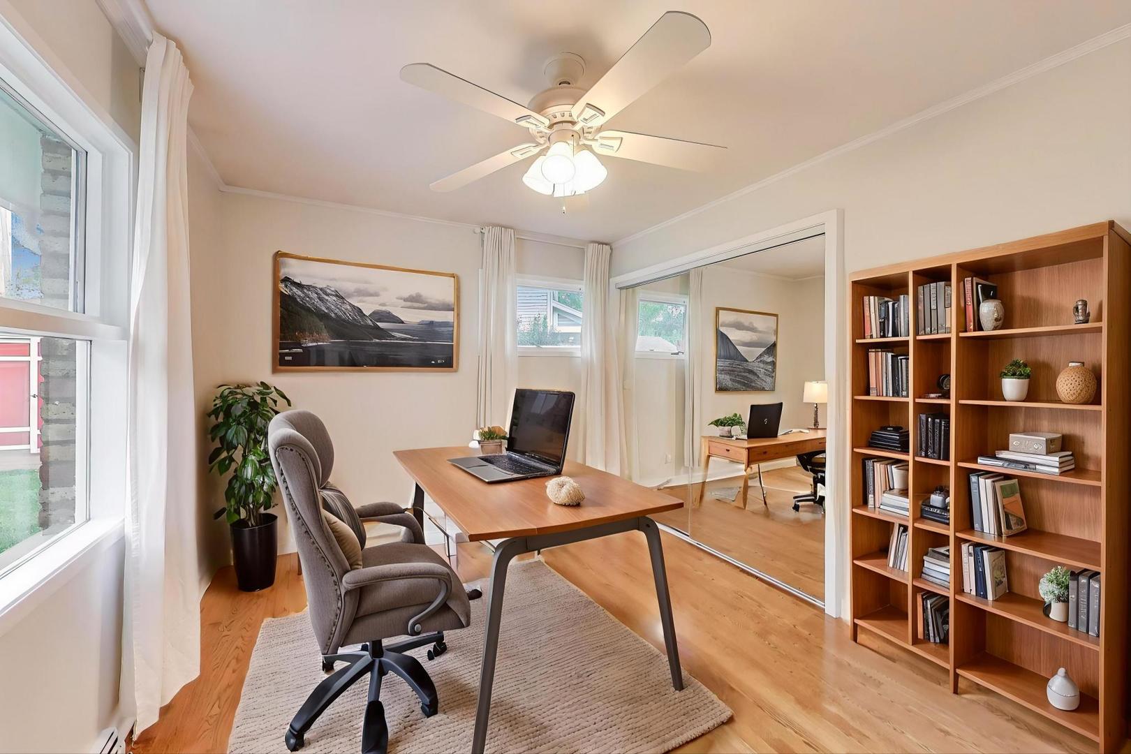 1022 Whitfield Road Northbrook, IL 60062 - Photo 11 of 29 a workspace with furniture and a bookshelf