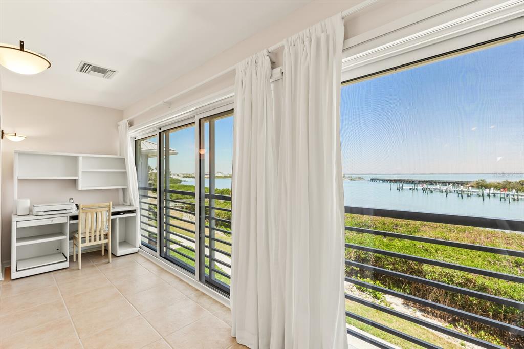 5856 Gasparilla Road, Unit MV26 Boca Grande, FL 33921 - Photo 6 of 38 a view of a kitchen with a sink and dishwasher open kitchen view