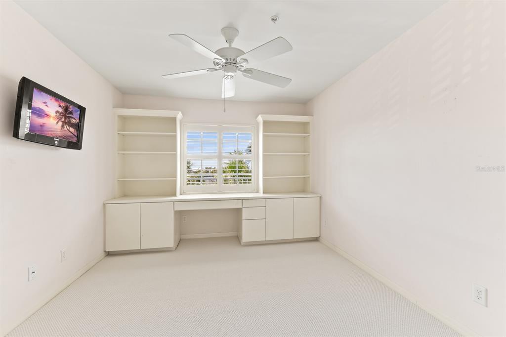 5856 Gasparilla Road, Unit MV26 Boca Grande, FL 33921 - Photo 9 of 38 a room with furniture and window