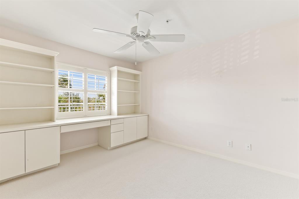 5856 Gasparilla Road, Unit MV26 Boca Grande, FL 33921 - Photo 10 of 38 a view of an empty room with a window