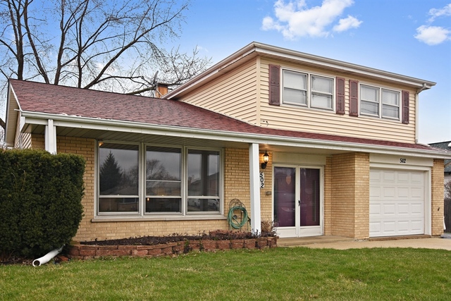 502 South Mt Prospect Road Des Plaines, IL 60016 - Photo 1 of 18 front view of a house with a yard