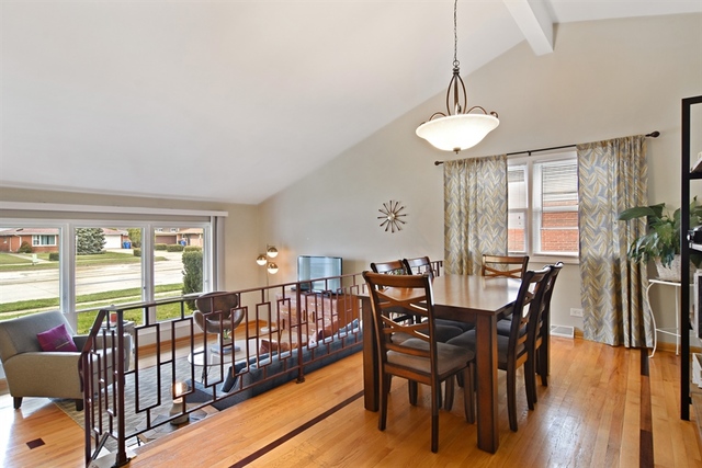 502 South Mt Prospect Road Des Plaines, IL 60016 - Photo 6 of 18 a view of a dining room with furniture window and wooden floor